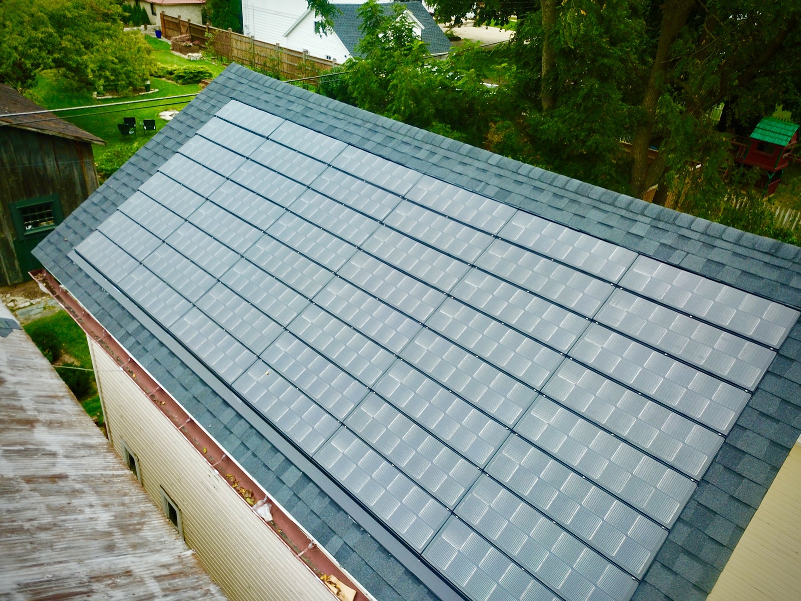 drone_sun_vault_roofing_barn_solar_roof_certainteed_solstice_shingle_Evansville_20250918_6small.jpg