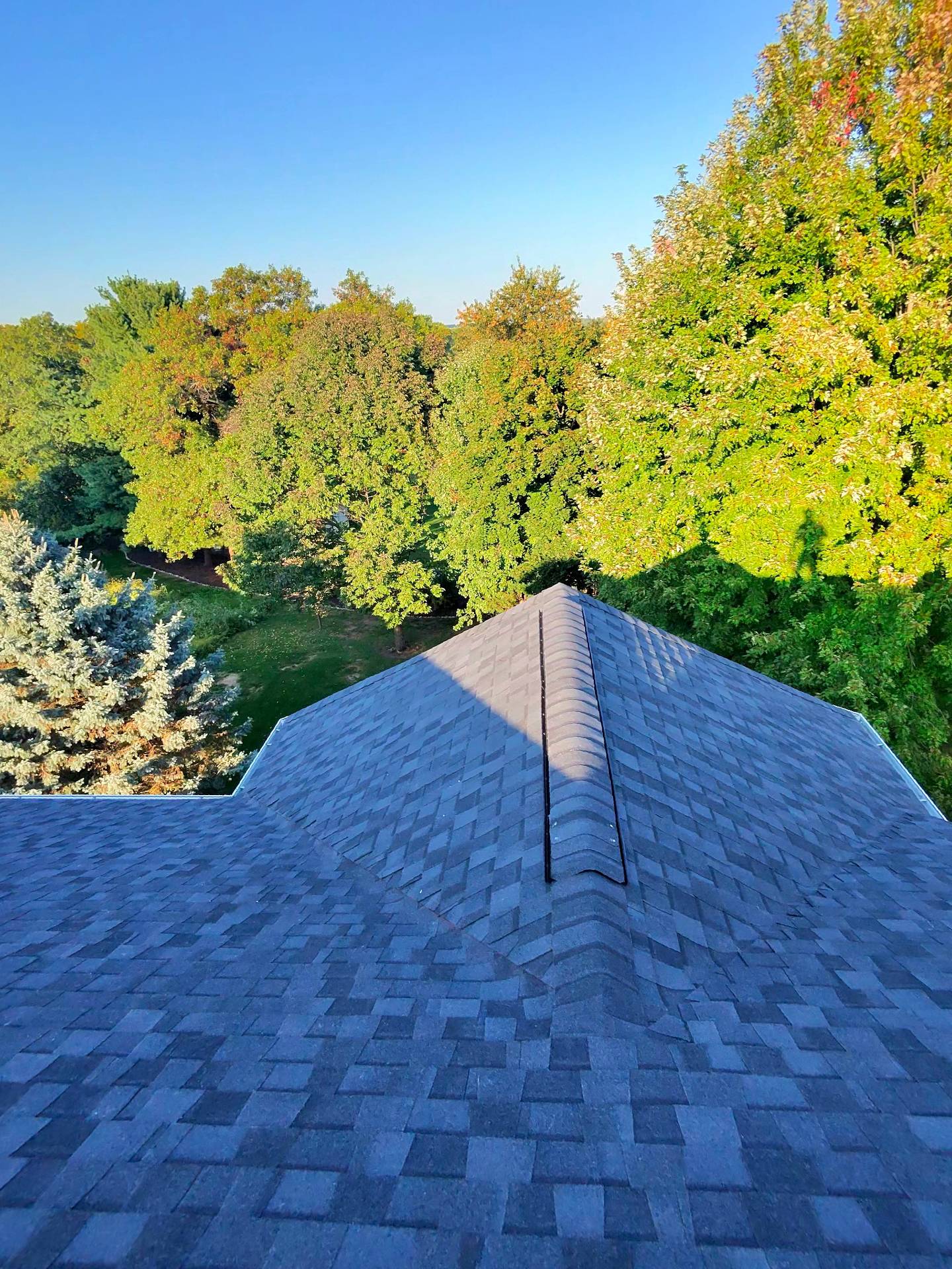reroof_sun_vault_roofing_Madison_wi_east_side_moire_black_sunset_asphalt_shingle_20250922_close9_16_25%2C%2005_59_48%20PM.jpg