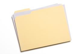 Manilla folder stuffed with paperwork